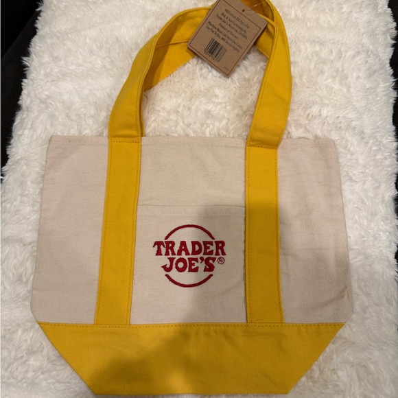 Trader Joe'S Handbags - Trader Joe's Yellow and Cream Canvas Tote